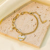 Wholesale Asymmetrical Pearl Heart Pendant Titanium Steel Bracelet For Women With Electroplating Design