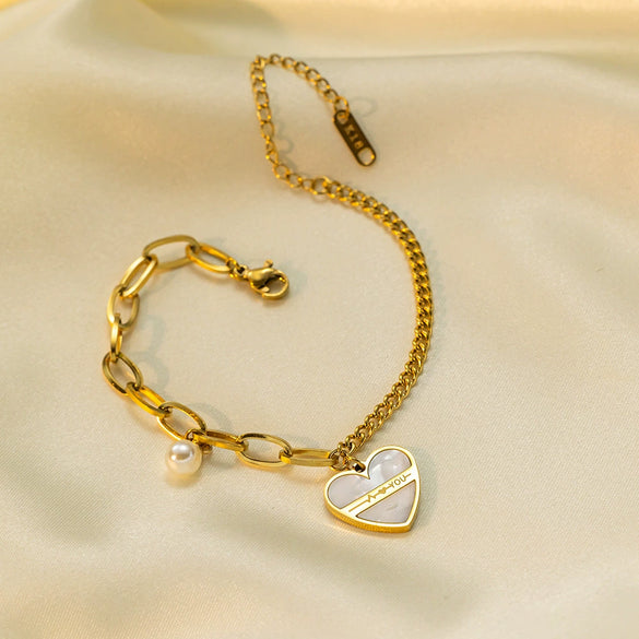 Wholesale Asymmetrical Pearl Heart Pendant Titanium Steel Bracelet For Women With Electroplating Design