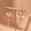 Wholesale Baroque Asymmetrical Earrings With Natural Pearl Flower Tassel Retro Temperament Metal Material And Electroplating Design