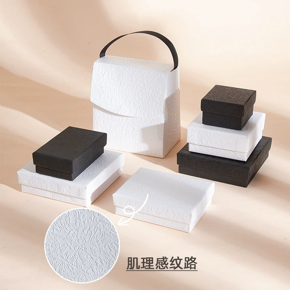 Wholesale Black And White Jewelry Packaging Box Made Of Paper And Cardboard With Hand Kneaded Design