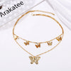 Wholesale Bohemian Fashion Alloy Butterfly Pendant Double Layer Necklace With Water Wave Chain And Geometric Pattern Electroplated