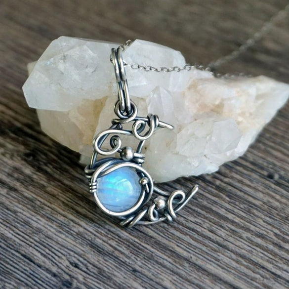 Wholesale Bohemian Style Moonstone Necklace With Winding Hollow Moon Pendant Alloy Material Geometric Pattern Electroplating Treatment