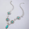 Wholesale Bohemian Style Turquoise Flower Pendant Alloy Necklace With Electroplating For Women