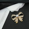Wholesale Bow Brooch Zinc Alloy Diamond Pearl Electroplating Unisex Fixed Accessories
