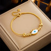 Wholesale Bracelet Titanium Steel Gold Plated Diamond Embedded Retro Love Eyes Round Style For Women