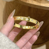 Wholesale Brass Microinlaid Fourleaf Clover Clasp Bracelet In Light Luxury Style