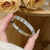 Wholesale Brass Microinlaid Fourleaf Clover Clasp Bracelet In Light Luxury Style
