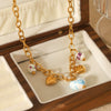 Wholesale Ceramic And Stainless Steel Heartshaped Tassel Necklace With Geometric Pattern And Electroplating For Women