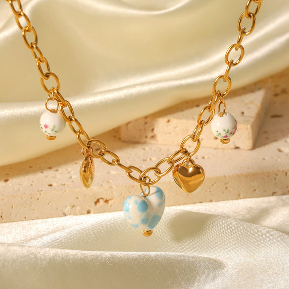 Wholesale Ceramic And Stainless Steel Heartshaped Tassel Necklace With Geometric Pattern And Electroplating For Women