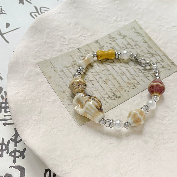 Wholesale Ceramic Conch Pattern Loose Beads For Handmade Jewelry Retro Style With High Temperature Flower Glaze And Paint Treatment