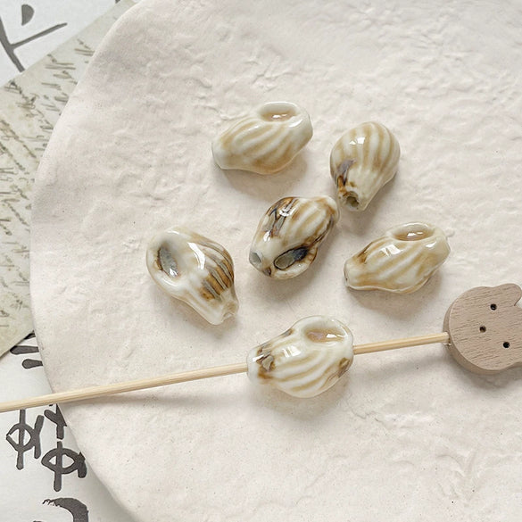 Wholesale Ceramic Conch Pattern Loose Beads For Handmade Jewelry Retro Style With High Temperature Flower Glaze And Paint Treatment