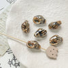 Wholesale Ceramic Conch Pattern Loose Beads For Handmade Jewelry Retro Style With High Temperature Flower Glaze And Paint Treatment