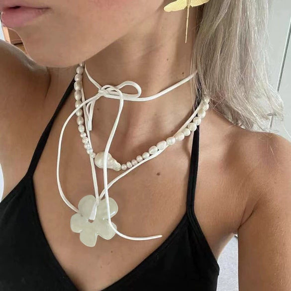 Wholesale Ceramic Pearl Star Pendant Necklace With Electroplating For Women Minimalist Style Water Wave Chain