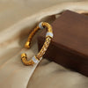 Wholesale Chic Style Woven Hollow Design Titanium Steel Open Bracelet For Female With Electroplating