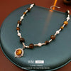 Wholesale Clavicle Chain Artificial Tiger Eye Stone And Pearl Geometric Style Electroplated Necklace