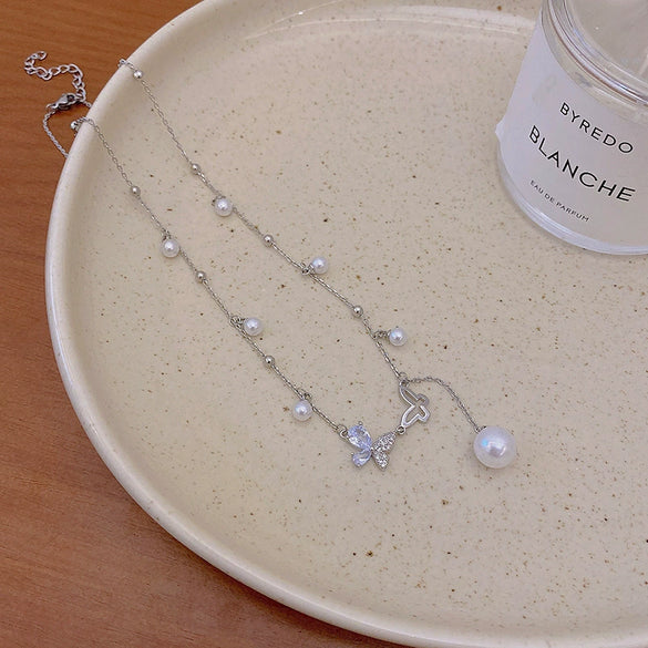 Wholesale Clavicle Chain Necklace Women's Titanium Steel Copper Electroplating Tassel Pearl Bow Design