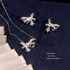 Wholesale Copper Bow Zircon Inlaid Women's Earrings