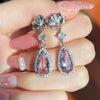 Wholesale Copper Drop Pear Shaped Flower Simulation Diamond Earrings