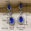 Wholesale Copper Dropshaped Flower Pattern Artificial Earrings For Women Business Style