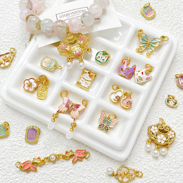 Wholesale Copper Enamel Gold Gilt Pendant With Butterfly Fox And Lotus Pattern For Diy Rope Bracelet Accessories Electroplating Process