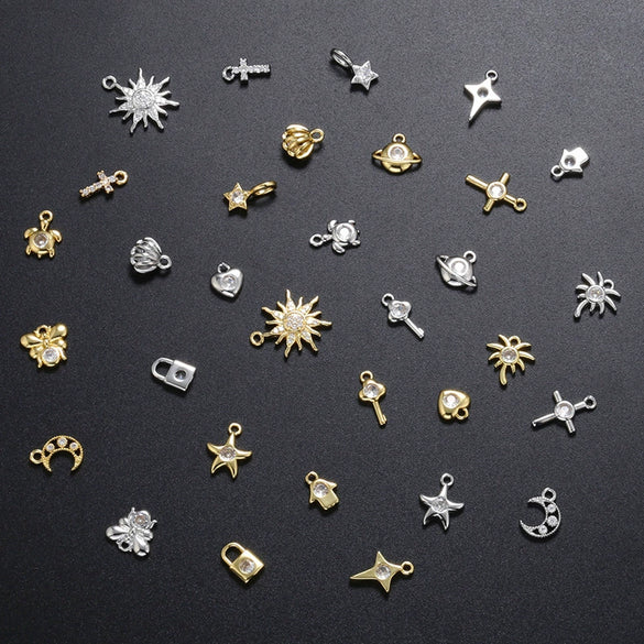 Wholesale Copper Fashion Pendant Collection With Micropaved Zircon Star Moon Cross And Heartshaped Designs Electroplated