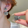 Wholesale Copper Flower Hollow Earrings Electroplated For Women Niche Creative Light Luxury High Grade