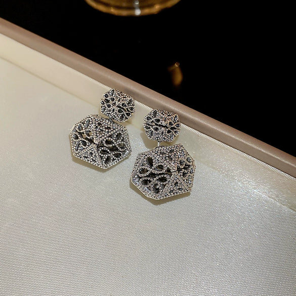 Wholesale Copper Flower Hollow Earrings Electroplated For Women Niche Creative Light Luxury High Grade