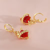 Wholesale Copper Heartshaped Sweet Retro Light Luxury Earrings For Women With Sacred Heart And Arrow Pattern