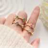 Wholesale Copper Inlaid Colored Diamond Geometric Flower Petal Fourleaf Clover Open Adjustable Women's Ring With Electroplating