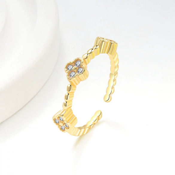 Wholesale Copper Inlaid Colored Diamond Geometric Flower Petal Fourleaf Clover Open Adjustable Women's Ring With Electroplating