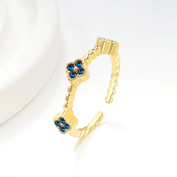 Wholesale Copper Inlaid Colored Diamond Geometric Flower Petal Fourleaf Clover Open Adjustable Women's Ring With Electroplating