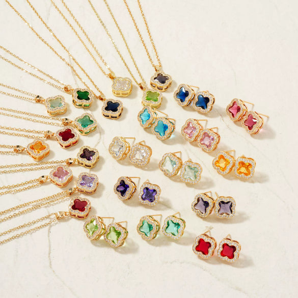 Wholesale Copper Inlaid Zircon Natural Plants And Flowers Style Fourleaf Clover Earrings And Necklace Twopiece Jewelry Set