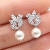 Wholesale Copper Inlaid Zircon Women's Earrings Simple Geometric Style With Leaf Shape And Imitation Pearl