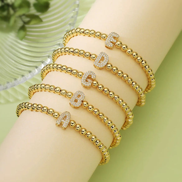 Wholesale Copper Inlaid Zirconium Letter Round Beaded Elastic Bracelet For Women Fashion Design