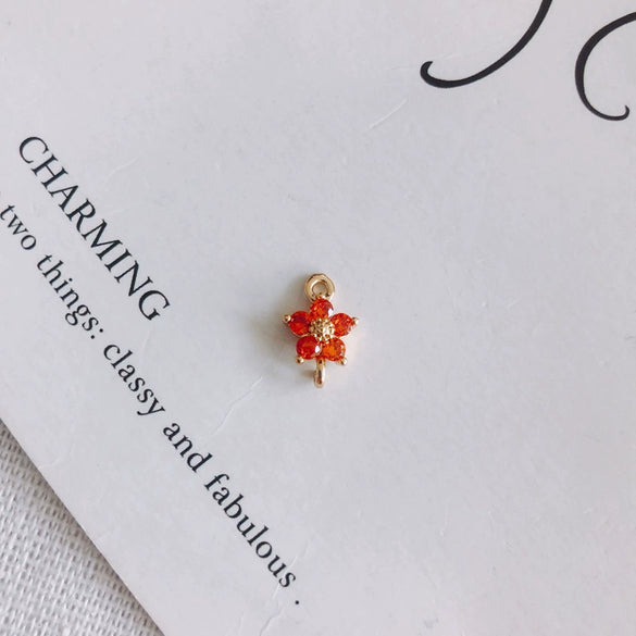 Wholesale Copper Plated Real Gold Hollow Flower Zircon Earrings Jewelry Accessories