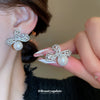 Wholesale Copper Silver Zircon Pearl Bow Earrings For Women Light Luxury Design