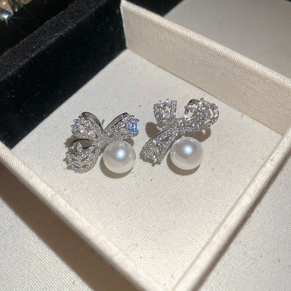 Wholesale Copper Silver Zircon Pearl Bow Earrings For Women Light Luxury Design