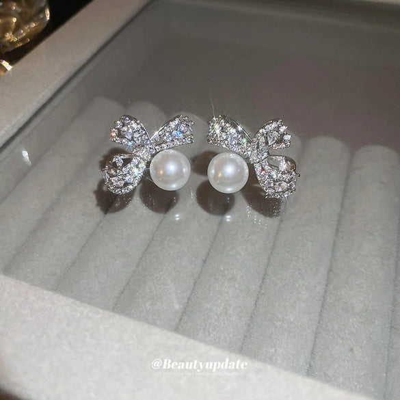 Wholesale Copper Silver Zircon Pearl Bow Earrings For Women Light Luxury Design