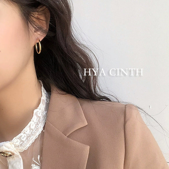 Wholesale Copper Simple Geometric Round Hollow Earrings For Women With Real Gold Plating