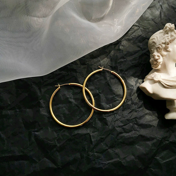 Wholesale Copper Simple Geometric Round Hollow Earrings For Women With Real Gold Plating