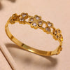 Wholesale Creative Hollow Love Four Leaf Flower Inlaid Zircon Stainless Steel Gold Plated Bracelet Jewelry