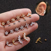 Wholesale Creative Metal Earrings With Inlaid Zircon And Flower Pattern