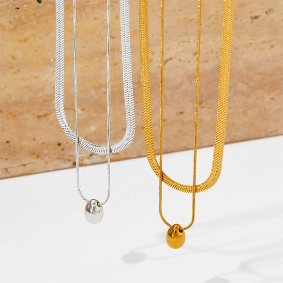 Wholesale Doublelayer Dropshaped Titanium Steel And Stainless Steel Pendant Necklace With Snake Bone Chain In Simple Style And Electroplating Treatment