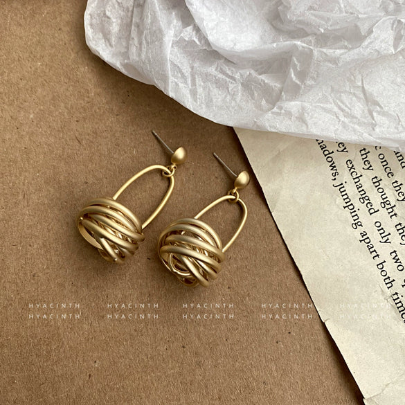 Wholesale Earrings Copper Alloy Geometric Matte Circle Knotted Hanging Basket Non Pierced Screw Clip