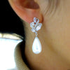 Wholesale Earrings Copper Imitation Pearl Dropshaped Flower Geometric Simple Style Women's