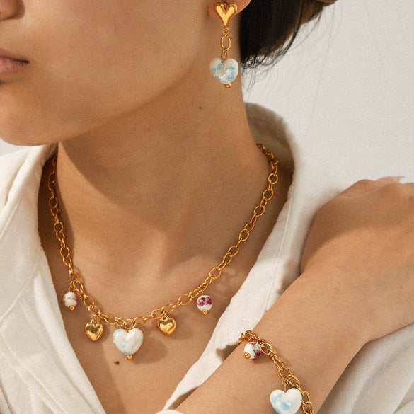 Wholesale Electroplated Stainless Steel And Ceramic Jewelry For Women With Heartshaped And Geometric Patterns Including Pendant Necklaces Bracelets And Earrings