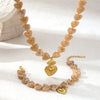 Wholesale Electroplated Stainless Steel And Titanium Steel Heart Beaded Sweater Chain Necklace For Women In Minimalist Ocean Series Style