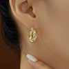 Wholesale Elegant Geometric Twist Circle Copper Zircon Earrings For Women