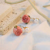 Wholesale Elegant Natural Pearl Rose Flower Glue Earrings With Electroplating