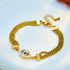 Wholesale Elegant Personality Blue Eyes Diamond Accessories Titanium Steel Multi Layer Chain Jewelry Bracelet With Geometric Pattern And Electroplating Process For Women